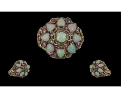 14ct Gold Opal &amp; Ruby Coloured Bombe Shaped Ring, stamped 14 ct to interior, set with tear drop shape opals.  Gross weigh