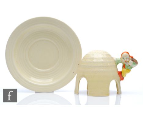 Clarice Cliff - Gnome Ware - A nightlight dome circa 1936, with a figure of a climbing gnome picked out in enamel colours ove