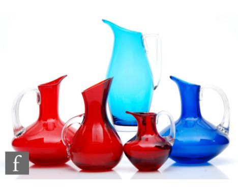 Whitefriars - A collection of jugs to include pattern number 9649, in Ruby, height 11cm, two pattern 9618 in Ruby and Blue, h