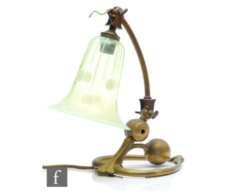 W A S Benson - An early 20th Century Arts and Crafts brass lamp bass with heart shaped base and an adjustable swan neck with 