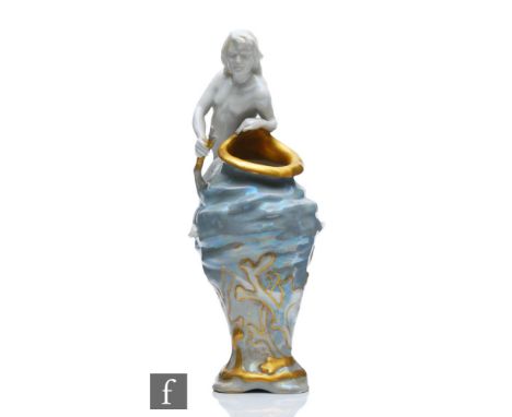 Max Hiller - Rosenthal Kronach - An early 20th Century Art Nouveau vase modelled as a merman sea creature sat on a swirling w