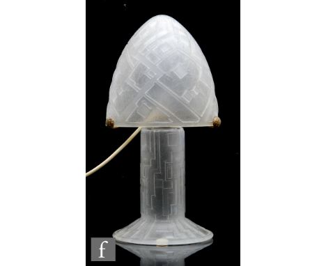 Daum - A 1920s clear crystal Art Deco table lamp, the high conical shade mounted to a wrought metal gallery above a cylindric
