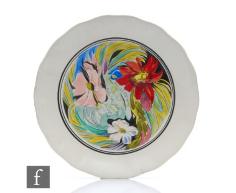 A Clarice Cliff and M.J.Riach wavy edged plate made for the Harrods Art in Industry Exhibition circa 1934, transfer printed a