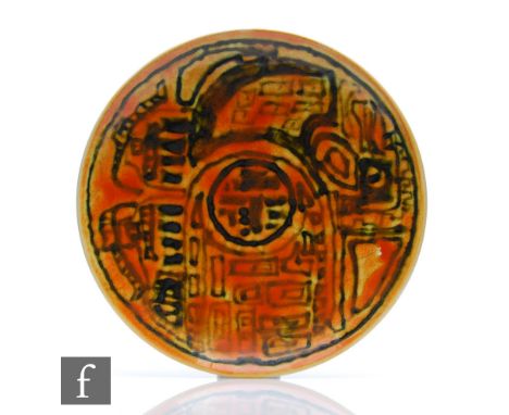 Poole Pottery Studio - An 8 inch plate decorated with an abstract 'Town Planning' design in dark green against an orange and 