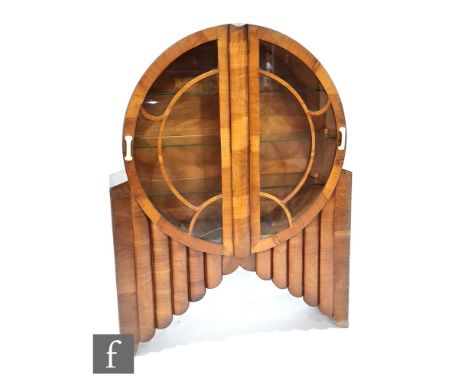 Unknown - A walnut veneered Alarm Clock display cabinet, with bar glazed double doors over a stepped base, height 135cm, widt