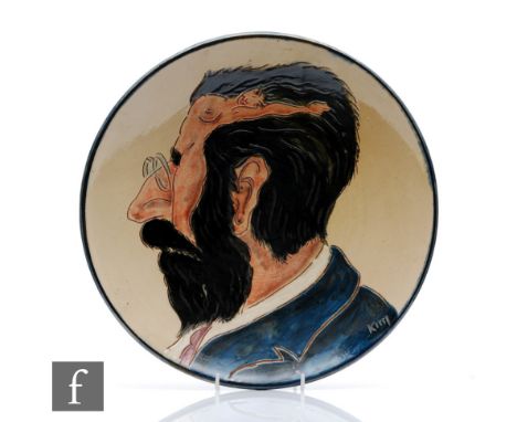 Unknown - A 20th Century German Studio ceramic charger, incised with a male portrait in profile with a nude female figure, si