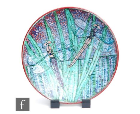 Tony Morris - Poole Studio - A large later 20th Century pottery charger decorated with two dragonflies amidst grasses against