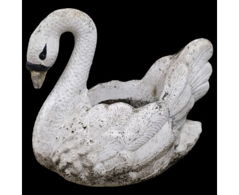 A painted cast reconstituted stone planter in the form of a swan. 58x50x44cm. 