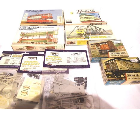 Three tram kits, Hadfield and Tower, Airfix and Dapol wagon kits x5, Airfix bridge kit. All appear complete but unchecked.  P