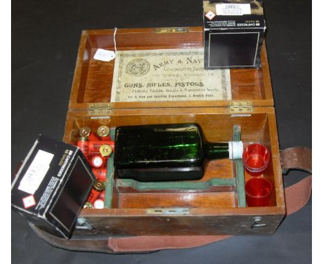 An Army and Navy Cooperative Society Limited box containing a quantity of various twelve gauge cartridges, glass bottle and v