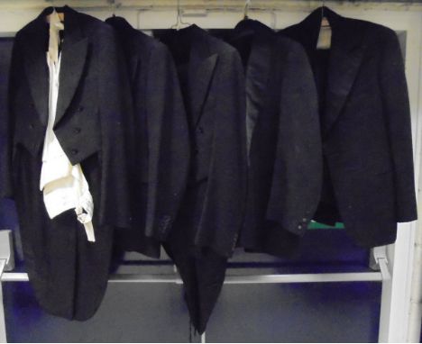 Five dinner / tail jackets, three with trousers and one waistcoat   CONDITION REPORTS   The first jacket has splits to  the e