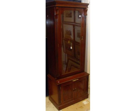 A modern mahogany gun cabinet as a Victorian display cabinet by 21st Century Antiques of Ripley Surrey, the upper section wit