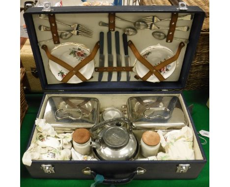A mid 20th Century vintage fitted picnic hamper containing sandwich tins, tea plates, teacups, saucers, etc   CONDITION REPOR