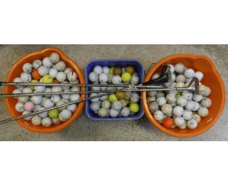 Three tubs of golf balls and a Golfsmith Three club, a Howson Derry club and a Diamond Five Max club