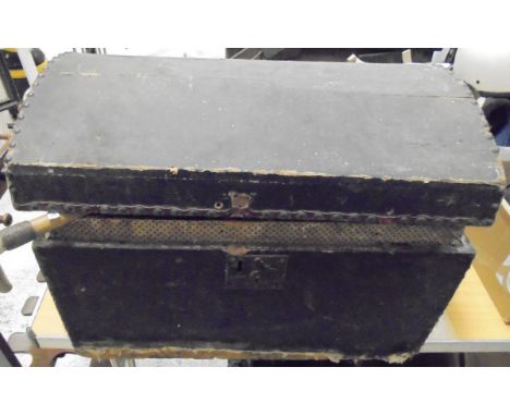 A canvas and studded dome-topped trunk bearing label to interior inscribed "Thomas Green, Trunk Maker, No. 49 Westgate Street