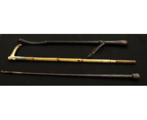 A gentleman's riding crop with antler handle and "Swaine & Adeney" button, silver ferrule, to a bamboo handle, together with 