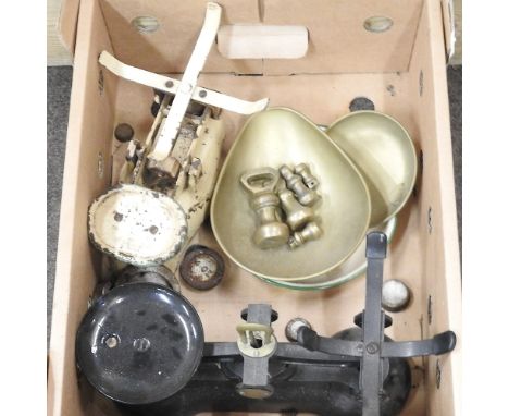 A set of cast iron kitchen scales, together with another set and various weights