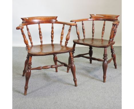 An early 20th century elm seated smoker's bow, together with another similar 