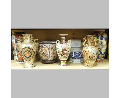 A shelf of oriental china, to include a pair of Japanese vases, 36cm high