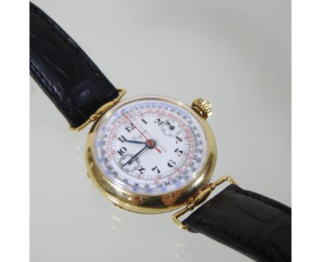 A 1920's Longines 18 carat gold cased chronograph wristwatch, the white circular dial with Arabic hours and two subsidiary di