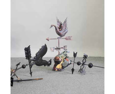 A black painted metal weather vane, in the form of a cockerel, 157cm high, together with two other weather vanes (3)