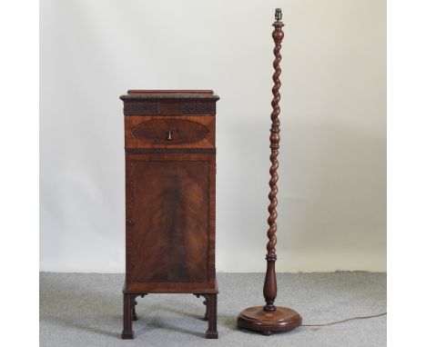 A 1920's mahogany narrow side cabinet, 47cm, together with a standard lamp, with barley twist decoration