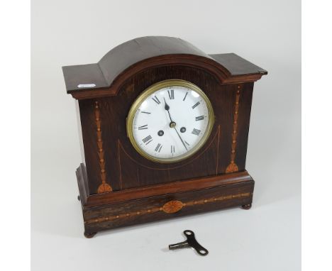 An Edwardian mahogany and inlaid mantel clock, 31cm