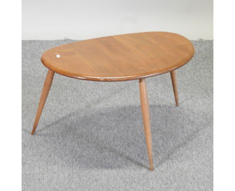 An Ercol light elm occasional table, 65cm