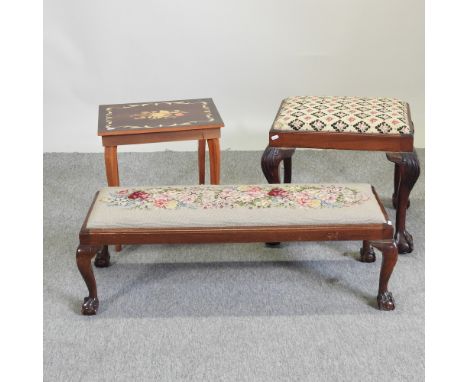 A 1920's long tapestry upholstered stool, 96cm, together with another and a table with Sorrento work decoration (3)