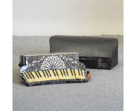 A piano accordion, by Donzelli, in a hard case, 66cm