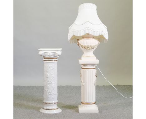 A cream painted jardiniere, together with a matching lamp and cream pottery jardiniere
