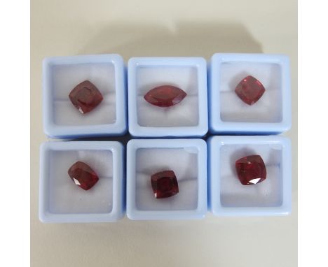 A collection of six unmounted natural ruby gemstones, with certificates