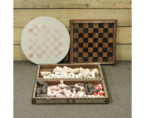 A chess set, together with another and a backgammon set