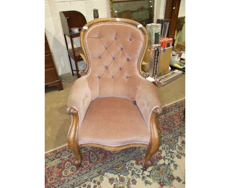 A Victorian mahogany button back salon chair.