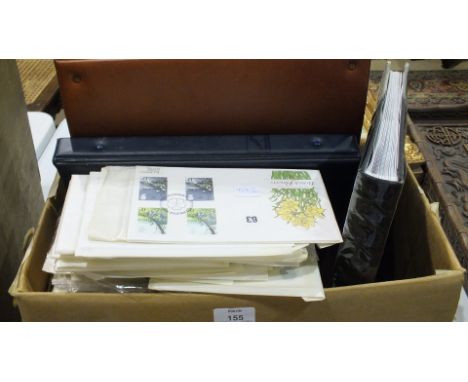 A quantity of first day covers and postal postcards, etc.