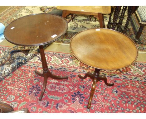 Two mahogany circular occasional tables on tripod supports, 51 and 56cm diameter, (2).