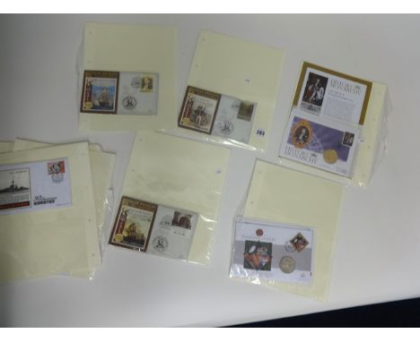 A small collection of Nelson Celebration first day covers and D Day gilt and decorated crowns.