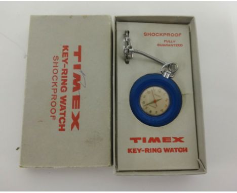 A Timex Tyre watch, key ring model, boxed.