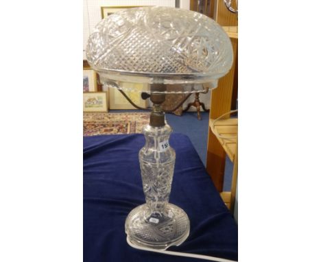 A large all glass table lamp and shade, a small hanging brass bell, Spode and other chinaware, also mirror, two prints.