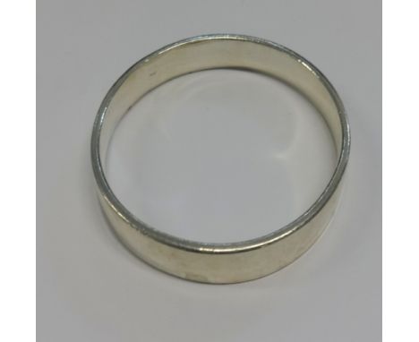 A Silver slave bangle.