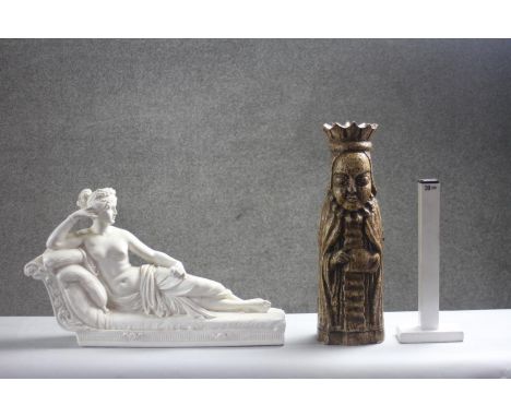 A plaster model of Venus Victrix by Antonio Canova along with a lacquered wooden bottle case in the form of a crowned figure.