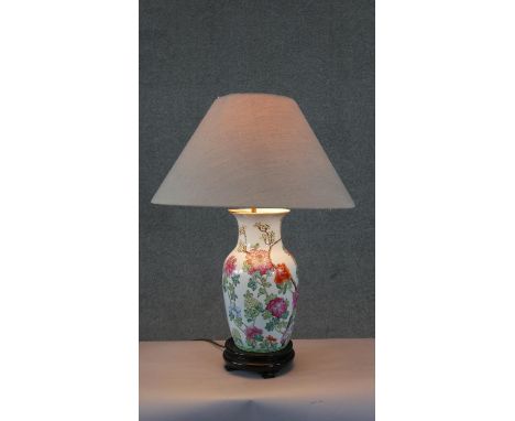 A vintage hand painted ceramic Chinese vase design table lamp. Decorated with Chinese lucky bats and peonies. H.67 W.53cm 