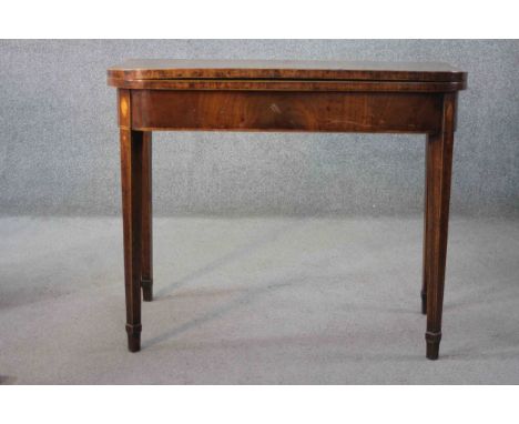 A Georgian mahogany and satinwood inlaid card table with foldover baize lined top and gateleg action. H.72 W.92 D.45 cm. 