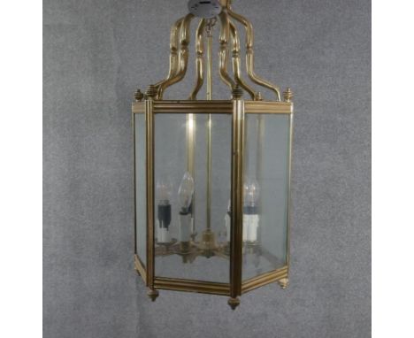 A large Victorian solid brass and glass hexagonal six branch lantern with ridged detailing and brass fittings.  H.78 W.42cm 