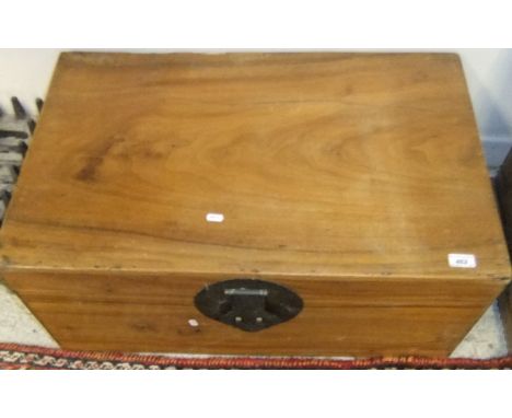 An Oriental teak trunk with large lock