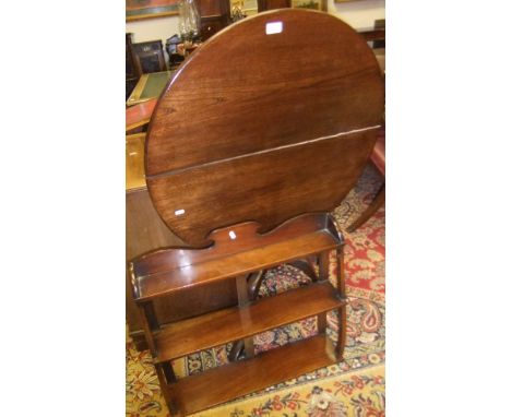 A 19th Century oak tea table, the circular snap top on a turned pedestal to tripod base, together with a circa 1900 mahogany 