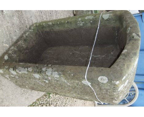 A stone trough with D end 