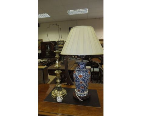 A Chinese porcelain baluster shaped table lamp with pleated cream shade, together with a Ringway brass candlestick style tabl