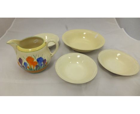 A Royal Staffordshire "Crocus by Clarice Cliff" Newport Pottery Co. jug, a collection of Clarice Cliff Newport Pottery Co. cr