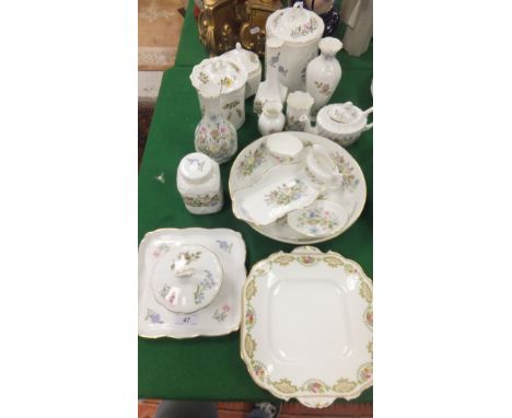 A collection of Aynsley decorative china wares to include miniature teapot, vases, canisters and covers, fruit bowl, serving 